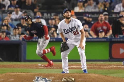 LOS ANGELES, CA – OCTOBER 28: Clayton Kershaw #22 of the Los Angeles Dodgers reacts after allowing a sixth inning home run to Mookie Betts #50 of the Boston Red Sox in Game Five of the 2018 World Series at Dodger Stadium on October 28, 2018 in Los Angeles, California. (Photo by Kevork Djansezian/Getty Images)