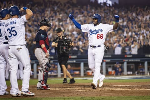 LOS ANGELES, CA – OCTOBER 27: Yasiel Puig #66 of the Los Angeles Dodgers reacts after hitting a three run home run during the sixth inning of game four of the 2018 World Series against the Boston Red Sox on October 27, 2018 at Dodger Stadium in Los Angeles, California. (Photo by Billie Weiss/Boston Red Sox/Getty Images)