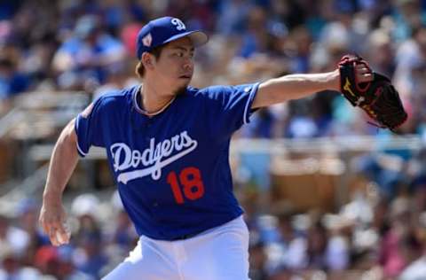 GLENDALE, ARIZONA – MARCH 09: Kenta Maeda #18 of the Los Angeles Dodgers delivers a pitch during the second inning of the spring training game against the Seattle Mariners at Camelback Ranch on March 09, 2019 in Glendale, Arizona. (Photo by Jennifer Stewart/Getty Images)