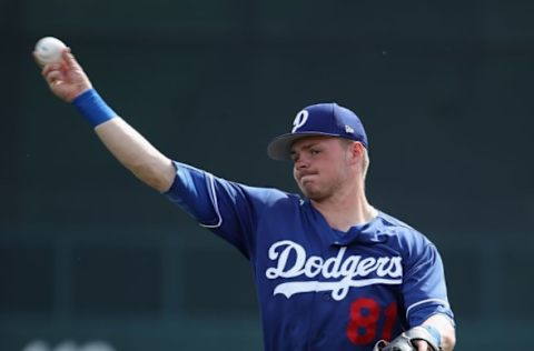 GLENDALE, ARIZONA – FEBRUARY 25: Gavin Lux #81 of the Los Angeles Dodgers warms up before the MLB spring training game against the Chicago Cubs at Camelback Ranch on February 25, 2019, in Glendale, Arizona. (Photo by Christian Petersen/Getty Images)