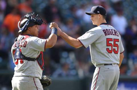 BALTIMORE, MD – APRIL 21: Willians Astudillo #64 and Taylor Rogers #55 of the Minnesota Twins celebrate a win after a baseball game against the Baltimore Orioles at Oriole Park at Camden Yards on April 21, 2019 in Baltimore, Maryland. (Photo by Mitchell Layton/Getty Images)