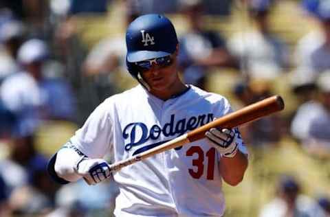 LOS ANGELES, CALIFORNIA – MARCH 31: Joc Pederson #31 of the Los Angeles Dodgers reacts after missing on a swing against the Arizona Diamondbacks during the sixth inning at Dodger Stadium on March 31, 2019 in Los Angeles, California. (Photo by Yong Teck Lim/Getty Images)