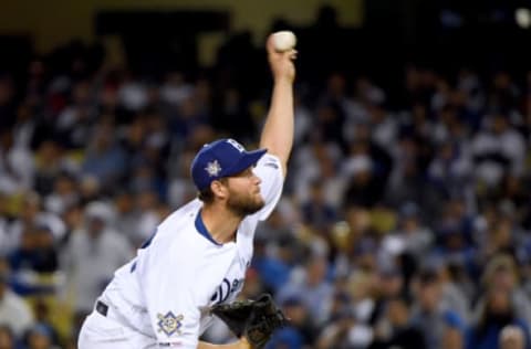 LOS ANGELES, CALIFORNIA – APRIL 15: Clayton Kershaw #42 of the Los Angeles Dodgers pitches in his first game of the 2019 regular season against the Cincinnati Reds during the sixth inning on Jackie Robinson Day at Dodger Stadium on April 15, 2019 in Los Angeles, California. All players are wearing the number 42 in honor of Jackie Robinson Day. (Photo by Harry How/Getty Images)