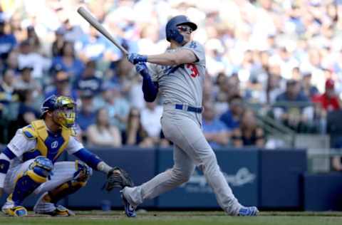 MILWAUKEE, WISCONSIN – APRIL 21: Joc Pederson #31 of the Los Angeles Dodgers hits a home run in the fourth inning against the Milwaukee Brewers at Miller Park on April 21, 2019 in Milwaukee, Wisconsin. (Photo by Dylan Buell/Getty Images)