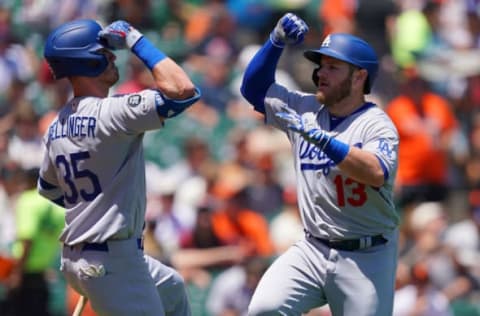 SAN FRANCISCO, CA – JUNE 09: Max Muncy #13 of the Los Angeles Dodgers is congratulated by Cody Bellinger #35 after Muncy hit a solo home run against the San Francisco Giants in the top of the first inning of a Major League Baseball game at Oracle Park on June 9, 2019 in San Francisco, California. (Photo by Thearon W. Henderson/Getty Images)