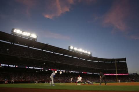 ANAHEIM, CALIFORNIA – JUNE 10: Pitcher Griffin Canning #47 of the Los Angeles Angels throws to first base to hold Alex Verdugo #27 of the Los Angeles Dodgers in the fourth inning of the MLB game at Angel Stadium of Anaheim on June 10, 2019, in Anaheim, California. (Photo by Victor Decolongon/Getty Images)