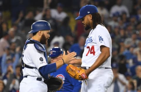 LOS ANGELES, CA – JUNE 14: Kenley Jansen #74 shakes hands with Russell Martin #55 of the Los Angeles Dodgers after earning a save in the ninth inning of the game against the Chicago Cubs at Dodger Stadium on June 14, 2019 in Los Angeles, California. (Photo by Jayne Kamin-Oncea/Getty Images)