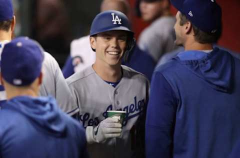 PHOENIX, ARIZONA – JUNE 05: Will Smith #16 of the Los Angeles Dodgers reacts in the dugout after hitting a two-run home run against the Arizona Diamondbacks during the third inning of the MLB game at Chase Field on June 05, 2019 in Phoenix, Arizona. (Photo by Christian Petersen/Getty Images)