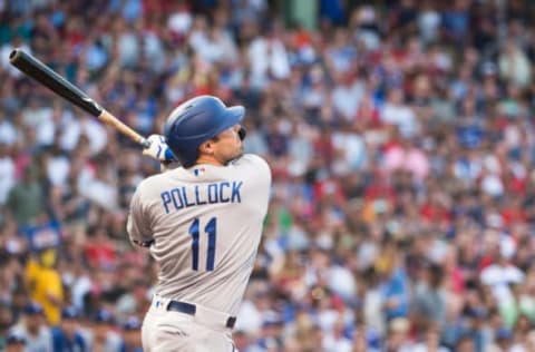 BOSTON, MA – JULY 14: A.J. Pollock #11 of the Los Angeles Dodgers hits a three run home run in the first inning against the Boston Red Sox at Fenway Park on July 14, 2019 in Boston, Massachusetts. (Photo by Kathryn Riley/Getty Images)