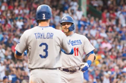 BOSTON, MA – JULY 14: A.J. Pollock #11 celebrates with teammate Chris Taylor #3 of the Los Angeles Dodgers after hitting a three run home run in the first inning against the Boston Red Sox at Fenway Park on July 14, 2019 in Boston, Massachusetts. (Photo by Kathryn Riley/Getty Images)