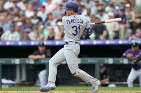 DENVER, COLORADO – JUNE 30: Joc Pederson #31 of the Los Angeles Dodgers hits a 2 RBI single in the sixth inning against the Colorado Rockies at Coors Field on June 30, 2019 in Denver, Colorado. (Photo by Matthew Stockman/Getty Images)