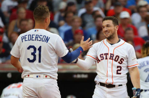 CLEVELAND, OHIO - JULY 08: Alex Bregman of the Houston Astros hugs Joc Pederson of the Los Angeles Dodgers during the T-Mobile Home Run Derby at Progressive Field on July 08, 2019 in Cleveland, Ohio. (Photo by Gregory Shamus/Getty Images)