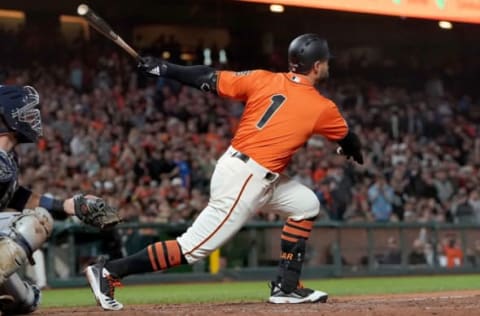 SAN FRANCISCO, CA – AUGUST 30: Kevin Pillar #1 of the San Francisco Giants hits a sacrifice fly scoring Evan Longoria against the San Diego Padres in the bottom of the seventh inning at Oracle Park on August 30, 2019 in San Francisco, California. The Giants won the game 8-3. (Photo by Thearon W. Henderson/Getty Images)