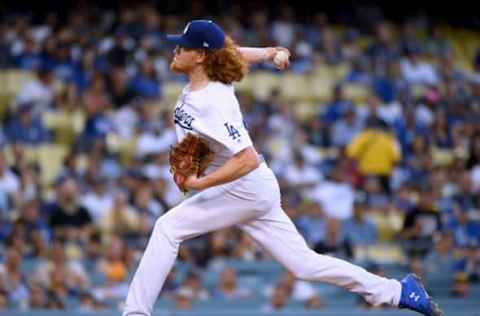 LOS ANGELES, CALIFORNIA – AUGUST 02: Dustin May #85 of the Los Angeles Dodgers pitches to the San Diego Padres during the second inning at Dodger Stadium on August 02, 2019 in Los Angeles, California. (Photo by Harry How/Getty Images)