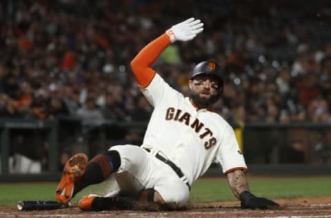 SAN FRANCISCO, CA – SEPTEMBER 09: Kevin Pillar #1 of the San Francisco Giants slides to score at home plate during the sixth inning against the Pittsburgh Pirates at Oracle Park on September 9, 2019 in San Francisco, California. (Photo by Stephen Lam/Getty Images)