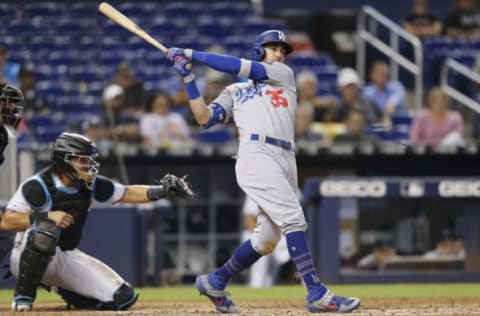 MIAMI, FLORIDA – AUGUST 15: Cody Bellinger #35 of the Los Angeles Dodgers hits a three-run home run in the seventh inning against the Miami Marlins at Marlins Park on August 15, 2019 in Miami, Florida. (Photo by Michael Reaves/Getty Images)