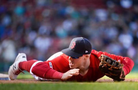 BOSTON, MA – SEPTEMBER 19: Brock Holt #12 of the Boston Red Sox reacts after missing a catch against the San Francisco Giants in the ninth inning at Fenway Park on September 19, 2019 in Boston, Massachusetts. (Photo by Kathryn Riley/Getty Images)