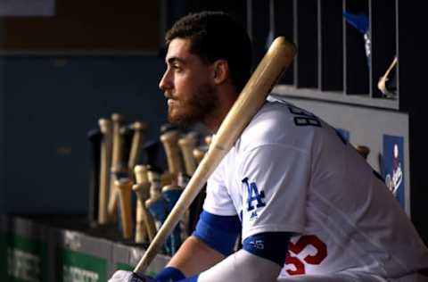 LOS ANGELES, CALIFORNIA – AUGUST 22: Cody Bellinger #35 of the Los Angeles Dodgers watches play from the dugout during the third inning against the Toronto Blue Jays at Dodger Stadium on August 22, 2019 in Los Angeles, California. (Photo by Harry How/Getty Images)