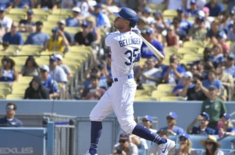 LOS ANGELES, CA – SEPTEMBER 22: Cody Bellinger #35 of the Los Angeles Dodgers hits a grand slam home run against the Colorado Rockies in the fifth inning at Dodger Stadium on September 22, 2019 in Los Angeles, California. (Photo by John McCoy/Getty Images)