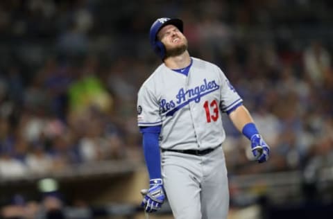 SAN DIEGO, CALIFORNIA – AUGUST 28: Max Muncy #13 of the Los Angeles Dodgers reacts after being hit by a pitch during the fifth inning of a game against the San Diego Padres at PETCO Park on August 28, 2019 in San Diego, California. Muncy left the game after being examined by trainers. (Photo by Sean M. Haffey/Getty Images)