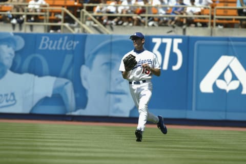 LOS ANGELES – JULY 16: Outfielder Shawn Green #15 of the Los Angeles Dodgers runs in from the outfield (Photo by Stephen Dunn/Getty Images)