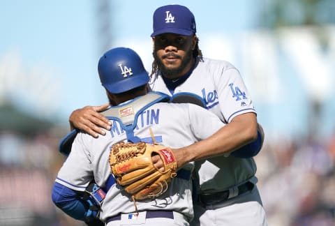 SAN FRANCISCO, CALIFORNIA – SEPTEMBER 28: Kenley Jansen #74 and Russell Martin #55 of the Los Angeles Dodgers celebrates defeating the San Francisco Giants 2-0 at Oracle Park on September 28, 2019 in San Francisco, California. (Photo by Thearon W. Henderson/Getty Images)