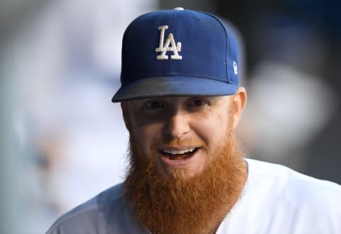 LOS ANGELES, CALIFORNIA – OCTOBER 03: Justin Turner #10 of the Los Angeles Dodgers smiles in the dugout in Los Angeles, California. (Photo by Harry How/Getty Images)