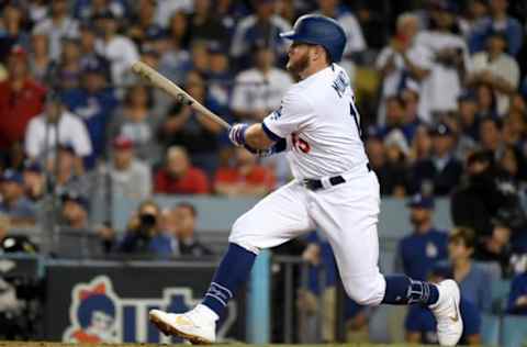 LOS ANGELES, CALIFORNIA – OCTOBER 03: Max Muncy #13 of the Los Angeles Dodgers hits a two run RBI single in the seventh inning of game one of the National League Division Series against the Washington Nationals to make it 4-0 at Dodger Stadium on October 03, 2019 in Los Angeles, California. (Photo by Harry How/Getty Images)