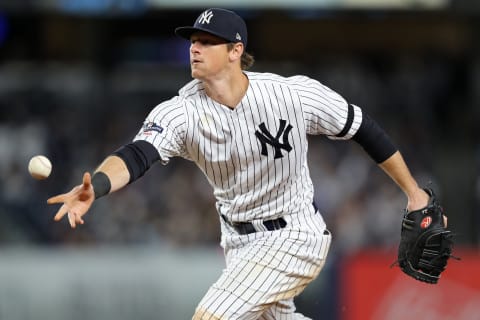 NEW YORK, NEW YORK – OCTOBER 05: DJ LeMahieu #26 of the New York Yankees tosses the ball to first base for an out on a ball hit by Jake Cave #60 of the Minnesota Twins in the fifth inning of game two of the American League Division Series at Yankee Stadium on October 05, 2019 in New York City. (Photo by Elsa/Getty Images)