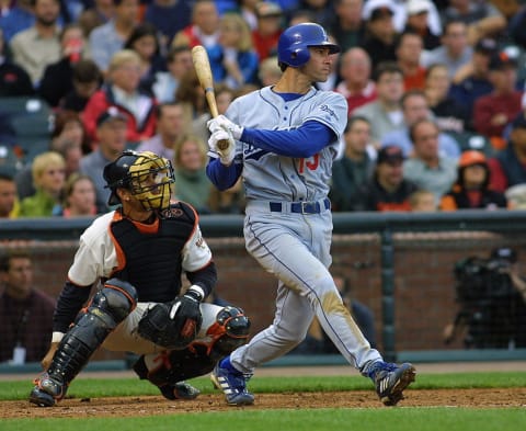 Los Angeles Dodgers Shawn Green follows through with an RBI single (Photo by JOHN G. MABANGLO / AFP) (Photo by JOHN G. MABANGLO/AFP via Getty Images)