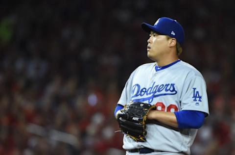 WASHINGTON, DC – OCTOBER 06: Pitcher Hyun-Jin Ryu #99 of the Los Angeles Dodgers waits to pitch in the first inning of Game 3 of the NLDS against the Washington Nationals at Nationals Park on October 06, 2019 in Washington, DC. (Photo by Will Newton/Getty Images)