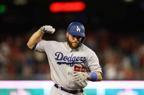 WASHINGTON, DC – OCTOBER 06: Russell Martin #55 of the Los Angeles Dodgers celebrates as he the bases after hitting a two run home run in the ninth inning of Game 3 of the NLDS against the Washington Nationals at Nationals Park on October 06, 2019 in Washington, DC. (Photo by Rob Carr/Getty Images)