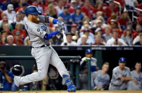 WASHINGTON, DC – OCTOBER 07: Justin Turner #10 of the Los Angeles Dodgers hits a solo home run in the first inning of game four of the National League Division Series against the Washington Nationals at Nationals Park on October 07, 2019 in Washington, DC. (Photo by Will Newton/Getty Images)