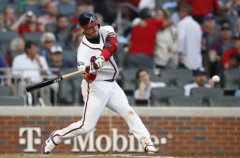 ATLANTA, GEORGIA – OCTOBER 09: Josh Donaldson #20 of the Atlanta Braves hits a solo home run against the St. Louis Cardinals during the fourth inning in game five of the National League Division Series at SunTrust Park on October 09, 2019 in Atlanta, Georgia. (Photo by Todd Kirkland/Getty Images)