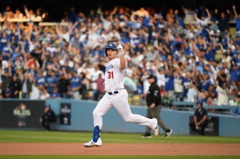 LOS ANGELES, CALIFORNIA – OCTOBER 09: Joc Pederson #31 of the Los Angeles Dodgers celebrates as he runs to second base on a ground rule double in the first inning of game five of the National League Division Series against the Washington Nationals at Dodger Stadium on October 09, 2019 in Los Angeles, California. (Photo by Harry How/Getty Images)