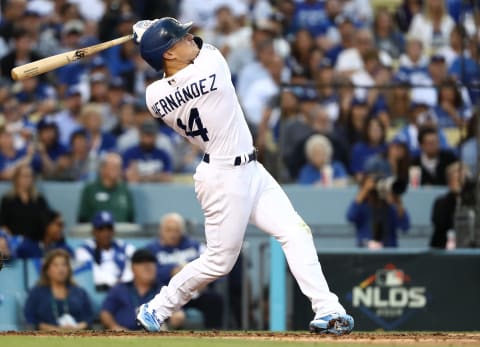 LOS ANGELES, CALIFORNIA – OCTOBER 09: Kike Hernandez #14 of the Los Angeles Dodgers hits a solo home run in the second inning of game five of the National League Division Series against the Washington Nationals at Dodger Stadium on October 09, 2019 in Los Angeles, California. (Photo by Sean M. Haffey/Getty Images)