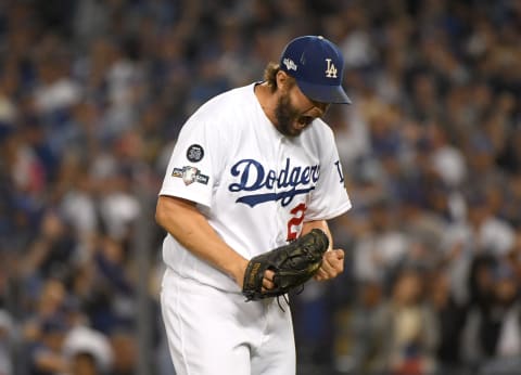 LOS ANGELES, CALIFORNIA – OCTOBER 09: Clayton Kershaw #22 of the Los Angeles Dodgers reacts to the third out of the seventh inning of game five of the National League Division Series against the Washington Nationals at Dodger Stadium on October 09, 2019 in Los Angeles, California. (Photo by Harry How/Getty Images)