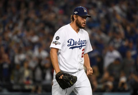 LOS ANGELES, CALIFORNIA – OCTOBER 09: Clayton Kershaw #22 of the Los Angeles Dodgers reacts to the third out of the seventh inning of game five of the National League Division Series against the Washington Nationals at Dodger Stadium on October 09, 2019 in Los Angeles, California. (Photo by Harry How/Getty Images)