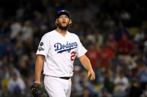 LOS ANGELES, CALIFORNIA – OCTOBER 09: Clayton Kershaw #22 of the Los Angeles Dodgers reacts as he leaves the game after giving up back to back home runs in the eighth inning of game five of the National League Division Series against the Washington Nationals at Dodger Stadium on October 09, 2019 in Los Angeles, California. (Photo by Harry How/Getty Images)