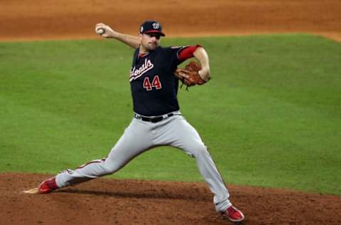 HOUSTON, TEXAS – OCTOBER 22: Daniel Hudson #44 of the Washington Nationals delivers the pitch against the Houston Astros during the eighth inning in Game One of the 2019 World Series at Minute Maid Park on October 22, 2019 in Houston, Texas. (Photo by Bob Levey/Getty Images)