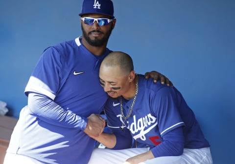 Mookie Betts with a Los Angeles Dodgers teammate. (Photo by Ralph Freso/Getty Images)