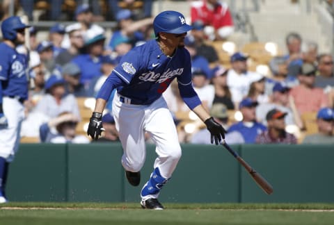 GLENDALE, ARIZONA – FEBRUARY 24: Mookie Betts #50 of the Los Angeles Dodgers runs to first base on a ground ball against the Chicago White Sox during the third inning of a Cactus League spring training game at Camelback Ranch on February 24, 2020 in Glendale, Arizona. (Photo by Ralph Freso/Getty Images)