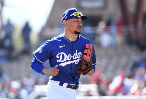 GLENDALE, ARIZONA – FEBRUARY 26: Mookie Betts #50 of the Los Angeles Dodgers runs back to the dugout from right field during a spring training game against the Los Angeles Angels at Camelback Ranch on February 26, 2020 in Glendale, Arizona. (Photo by Norm Hall/Getty Images)