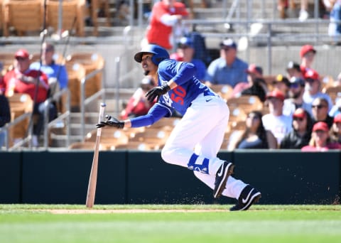 GLENDALE, ARIZONA – FEBRUARY 26: Mookie Betts #50 of the Los Angeles Dodgers follows through on a swing during a spring training game against the Los Angeles Angels at Camelback Ranch on February 26, 2020 in Glendale, Arizona. (Photo by Norm Hall/Getty Images)