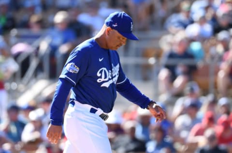 GLENDALE, ARIZONA - FEBRUARY 26: Manager Dave Roberts #30 of the Los Angeles Dodgers walks back to the dugout after making a pitching change during the fourth inning of a spring training game against the Los Angeles Angels at Camelback Ranch on February 26, 2020 in Glendale, Arizona. (Photo by Norm Hall/Getty Images)