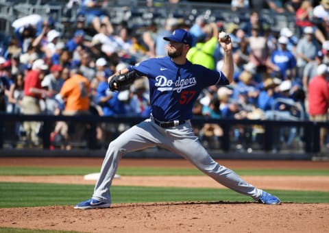 PEORIA, ARIZONA – MARCH 09: Alex Wood #57 of the Los Angeles Dodgers delivers a pitch against the San Diego Padres during a spring training game at Peoria Stadium on March 09, 2020 in Peoria, Arizona. (Photo by Norm Hall/Getty Images)