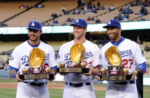 LOS ANGELES, CA – APRIL 13: (L-R) Andre Ethier #16, Clayton Kershaw #22 and Matt Kemp #27 of the Los Angeles Dodgers pose with their 2011 Golden Gloves before the game against the San Diego Padres at Dodger Stadium on April 13, 2012 in Los Angeles, California. (Photo by Harry How/Getty Images)