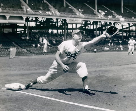 Brooklyn Dodger Gil Hodges photographed at first base during practice. (Photo by Barney Stein/Sports Studio Photos/Getty Images)