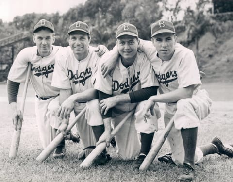 HAVANA, CUBA – 1942: Brooklyn Dodgers Arky Vaughan, Dolph Camilli, Billy Herman and PeeWee Reese photographed at Spring Training in Havana, Cuba in March 1942. (Photo by Greene Photography/Sports Studio Photos/Getty Images)