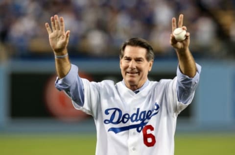 LOS ANGELES, CA – OCTOBER 07: Los Angeles Dodgers legend Steve Garvey throws out a ceremonial first pitch before the Dodgers take on the Atlanta Braves in Game Four of the National League Division Series at Dodger Stadium on October 7, 2013 in Los Angeles, California. (Photo by Stephen Dunn/Getty Images)